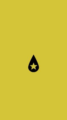 a yellow background with a black star in the middle and an upside down symbol above it