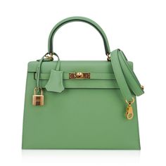 Green Formal Satchel With Handles, Formal Green Satchel With Handles, Classic Green Satchel For Shopping, Green Formal Satchel With Top Handle, Green Top Handle Satchel For Formal Occasions, Green Luxury Satchel For Daily Use, Elegant Green Satchel For Office, Elegant Green Office Satchel, Classic Green Bag With Detachable Handle