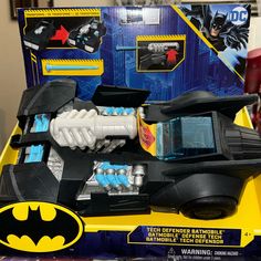 the batman batmobile is in its box and ready to be used as a toy