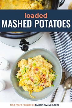 loaded mashed potatoes in a bowl next to an instant pressure cooker and spoon