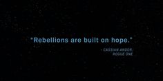 the words rebelliousns are built on hope written in blue ink against a black background