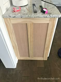 a kitchen counter that has some items on top of it and is being worked on