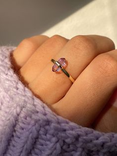 Dainty and beautiful with a bit of an edge, the Aphrodite Ring lets our all time favorite crystal shine in all of her beauty. A stunning way to bring this powerful stone into your every day look, amethyst is historically known to promote serenity, ease stress, and help wearers manifest their highest selves. 💜 * * * Don't know your ring size? View our Ring Size Guide * * * …………………………………. RING SIZE & MATERIAL❋ 14k gold plated sterling silver or rhodium plated sterling silver❋ natural amethyst cry Dainty Stone Rings, Gold Crystal Ring, Amethyst Jewelry Aesthetic, Crystal Jewelry Aesthetic, Aphrodite Ring, Stone Rings Women, Vampire Aesthetics, Solid Opal Ring, Purple Jewellery