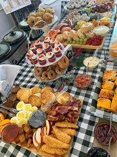 an assortment of finger foods and pastries on a buffet table