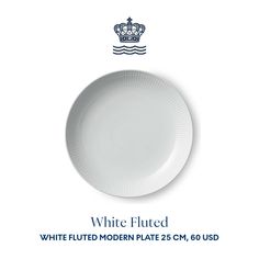 a white plate with a crown on it and the words white fluted written in blue