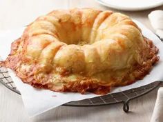 a bundt cake sitting on top of a cooling rack