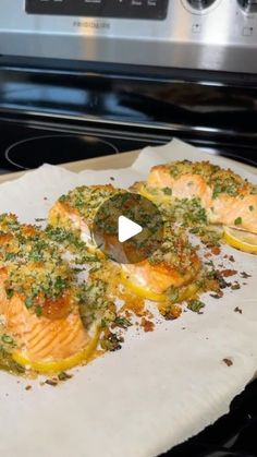 some food is sitting on top of a paper towel in front of an oven door