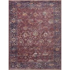 an antique style rug in red and purple tones