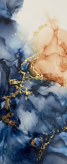 an abstract painting with gold and blue colors on the surface is featured in this image