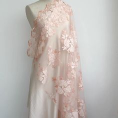 This delicate lace fabric is beautifully crafted with 3D floral appliqués, laser-cut for precision and a luxurious finish. The soft, light pink-orange hue enhances the intricate floral design, making it ideal for creating Hanfu, gowns, and special occasion dresses. The breathable netting base ensures comfort while the floral motifs bring sophistication to your design projects. 3D Floral Appliqués: Gorgeous flowers carefully laser-cut and embroidered for a high-quality finish. Soft and Comfortable: The lightweight netting fabric is both breathable and soft, ideal for elegant garments. Versatile Usage: Perfect for crafting traditional Hanfu, wedding dresses, and other formal wear. Netting Fabric, Gown Ideas, Gorgeous Flowers, Dress Gloves, Fantasy Dress, Inspired Dress, Floral Motifs, Fabric Samples, Soft Light