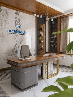 an office with marble walls and flooring is pictured in this image, the desk has a gray chair on it