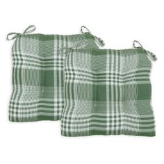 two green and white checkered kitchen towels on a white background with the same pattern