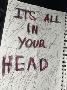 a notebook with the words it's all in your head written on it