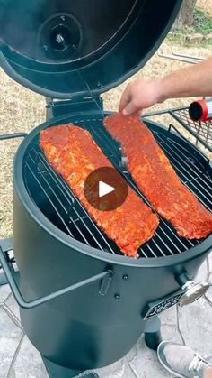 someone is grilling some meat on the grill