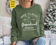 Mrs Claus Gingerbread Christmas Sweatshirt, Women Christmas Shirt, Funny Christmas Gift, Womens Sweater, Retro Christmas Youth Hoodies and Sweatshirts Please note: Our youth hoodies and sweatshirts are designed without drawstrings for safety and comfort. Product Highlights Material: Constructed from a premium blend of 50% cotton and 50% polyester, providing an ideal balance of softness and warmth. Fit: Designed with unisex sizing to offer a relaxed and comfortable fit for all. Detailed Specifications Fabric Weight: 8.0 oz./yd² (271.25 g/m²) for a cozy, medium-weight feel. Quality Construction: Features air jet yarn for a smoother finish and reduced pilling over time. Durable Stitching: Reinforced with double-needle stitching on shoulders, armholes, neck, waistband, and cuffs for added dura Official Cookie Tester, Matching Christmas Sweaters, Christmas Youth, Christmas Shirt Funny, Couples Sweatshirts, Gingerbread Christmas, Funny Christmas Gifts, Womens Sweater