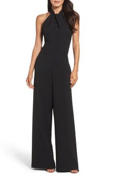 Trade in your LBD for something a bit more modern, like this halter-neck jumpsuit that can be easily dressed up or down with a change of footwear. 55" center front length; 30" inseam; 27" leg opening (size 8) Halter neck Sleeveless, with cutaway shoulders Lined 97% polyester, 3% spandex Dry clean or machine wash, tumble dry Imported Model stats: 5'10" height, 32" bust, 25" waist, 36" hip. Model is wearing size 8. Bride Jumpsuit, Bridesmaids Jumpsuits, Bride Suit, Chiffon Jacket, Halter Neck Jumpsuit, Coverall Jumpsuit, Bridal Jumpsuit, Fall Wedding Guest Dress, Jumpsuit Dressy