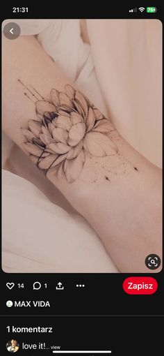 a person with a flower tattoo on their arm