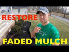 a man standing in front of a house with the words restore faded mulch on it