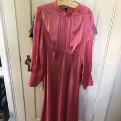 Offered For Sale Is An Absolutely Stunning Veronica Beard Fushia Silk Long Sleeve Ankle Length Dress.Worn Once.In Pristine Condition. The Empire Waist With Long Flowing Skirt Is Very Flattering Long Sleeves With 9 Buttons Back Has A Ribbon Closure And Zipper Along The Side Gives A Fitted Bodice But Then The Skirt Is Flowy.There Is Soft Gathering In The Front. Long Flowing Skirts, Ankle Length Dress, Flowing Skirt, Veronica Beard, Fitted Bodice, Empire Waist, Silk Dress, Ankle Length, Bodice