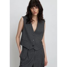 Introducing the new Stella Nova Tailored Vest in a grey pinstripe finish. Featuring a V shaped neckline and button centrefront, this style can be adjusted at the back to fit as you wish. This tailored look is bang on trend this season and this style also features:     Suit vest with a tailored look  Three button down centre front   Two small pockets   Solid grey on one side, grey pinstripe on the other   Adjustable double ring buckle   Lined throughout    Rock that cool, Scandi workwear look and Scandi Workwear, Stella Nova, Tailored Vest, Anna Beck, Double Ring, Suit Vest, Tailored Pants, Vintage Tee, 가을 패션