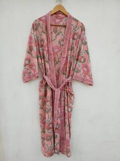 A robe and kimono is a perfect addition to your holiday wardrobe. A perfect loungewear kimono robes are comfortable for hot humid summer days. The block printing on the fabric is rich and vibrant. Colours may vary due to screen setting and lightening. Specification: Length : 47 inch Bust : Fit upto 50 inch Pockets : Yes With belt. For any other information please drop me a message. Womens Bathrobes, Nightwear Dress, Cotton Dressing Gown, Kimono Dressing Gown, Kimono Floral, Clothing Haul, Printed Robe, Floral Robes, Cotton Kimono