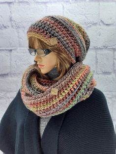 A super soft hat and scarf set for todays chic woman, crocheted in a beautiful ombre yarn with subtle, textured bands of pattern. Versatile, soft and cosy, you can wear this cowl scarf and slouchy beanie in two ways, as the clever use of reversible crochet gives you two different looks! The infinity scarf is long enough to loop around your neck once keeping you snug and warm on the coldest of days.  Choose from ten gorgous shades. The hat and cowl pictured are made using shade MC45, a fabulous m Reversible Crochet, Womens Slouchy Beanie, Hat And Scarf Set, Crochet Dog Sweater, Wool Accessories, Ombre Yarn, Soft Hats, Reversible Scarf, Hat And Scarf Sets