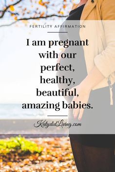 a pregnant woman with her belly exposed and the words, i am pregnant with our perfect, beautiful, amazing, amazing babies