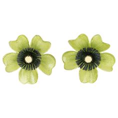 These lovely Monique Vedie resin or Talosel clip-on earrings feature a daisy flower shape with a carved dimensional design complimented with a textured pattern in glittering pistachio green and black colors with a tiny mirror heart. The pieces have French clip fastenings. There is no visible signature like all the Monique Vedie vintage pieces. Measurements: 1.69 in diameter (4.2 cm) Note: Monique Vedie was born in the 1920s and has been a student at the Line Vautrin School in Paris, where she le Tiny Mirror, A Daisy Flower, Line Vautrin, French Clip, Pistachio Green, Cellulose Acetate, Antique Earrings, Clip Earrings, Green And Black