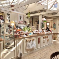 the inside of a restaurant with lots of food