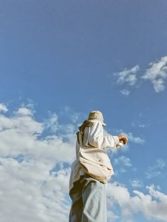 a person flying a kite in the sky