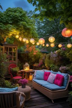 an outdoor patio is lit up with lanterns