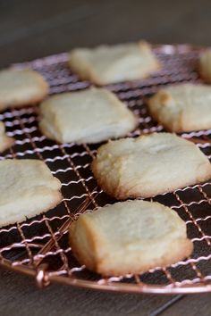 some cookies are cooling on a wire rack