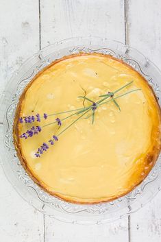 a pie with lavender sprigs sitting on top of it