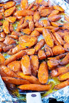 baked sweet potatoes on tin foil in an oven