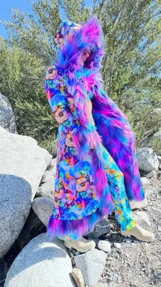 Electric Daisy Faux Fur Coat: Ignite Your Festival Spirit! Step into a world of vibrant energy and dazzling color with the Electric Daisy Fur Coat. Perfect for festivals and a bright, lively lifestyle, this coat will make you the star of any event. Electric Daisy Fur Coat bursts with purple, blue, pink, and turquoise neon colors, reflecting the vivacity and excitement of festival life. Power up your magic with this enchanting boho coat. This coat will be handmade for you in San Francisco. FEATUR Fitted Multicolor Long Outerwear, Fitted Multicolor Long Coat, Multicolor Winter Outerwear For Costume Party, Multicolor Outerwear For Winter Costume Party, Funky Long Sleeve Winter Outerwear, Multicolor Outerwear For Fall Costume Party, Funky Multicolor Winter Outerwear, Funky Multicolor Fall Outerwear, Tiy Diy