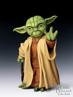 a star wars yoda action figure is shown