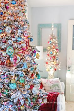 a decorated christmas tree in a living room