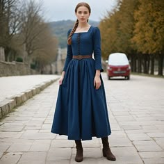 Immerse yourself in the past with our Women Viking Lace-Up Summer Dress, a garment that seamlessly combines historical inspiration with modern style. Crafted with a focus on authenticity, this dress features a lace-up front that adds a touch of medieval charm, making it perfect for Renaissance fairs, pirate reenactments, and thematic events. The breathable fabric ensures comfort, making it an ideal choice for warmer weather, while the flowing silhouette flatters a variety of body types, echoing Navy Blue Dress Winter, Medieval Inspired Outfits, Modern Historical Fashion, Pirate Dresses, Midevil Outfits, Medieval Outfit Women, Old Fashioned Dresses, Narnia Dresses, Hobbit Fashion