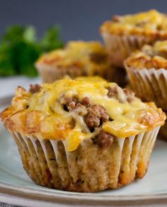 some meat and cheese muffins on a plate