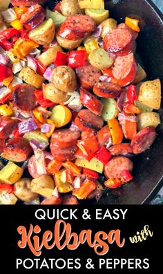 a skillet filled with kielbasa potatoes and peppers