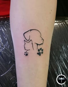 a dog's paw and paw print on the left arm is shown in black ink