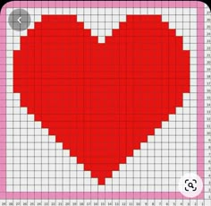 a cross stitch pattern with a red heart on it