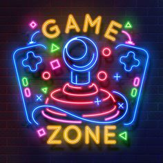 game zone neon sign on brick wall with glowing text and video game controller in the center