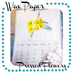 a calendar with yellow flowers on it and the words, wae paper pressed flowers