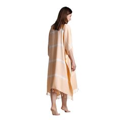 YAREN Turkish Towel pancho dress is high-quality, 100% Bamboo with fringes. One Size. Absorbs water and dries quickly. Light and space saving. Hand loomed in Turkey. Produced by dyed yarn. All fringes are knotted by ladies in the village. ⬛ DETAILS Weight : 250 g Size : Standart one size. - A gentle wash with cold water, makes the towel more absorbent and softens the fabric. - Up to ±10% change on dimension and weight, imperfections in pattern and color must be tolerated as a result of handloom Long Beige Summer Cover-up, Spring Beach Cotton Tunic, Casual Beach Poncho In Relaxed Fit, Summer Beachwear Tunic For Beach Cover-up, Casual Beach Poncho With Relaxed Fit, Beige Summer Beach Dress For Poolside, Beige Summer Beach Dress, Casual White Sarong For Beach, Summer Tunic Poncho