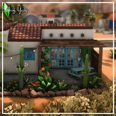 a small house with cactus and cacti around it