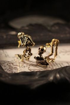 The skeleton earrings, original design and made by Defy One of our unique skeletons collections. The skeleton are great handmade in details. - The skeleton dimensions are : 2.2 x 1.3 cm. - New and clean earring wires. - Material : Brass / Silver **Free Shipping to World Wide** - Please allow us to prepare the item and parcel between 3-5 working days (*Between 5-7 working days For Sterling Silver 925*) - All items will be sent by Thai Registered Airmail. The delivery usually takes about 2-4 weeks Dark Style Fashion, Accessories Dark, Raven Skull Necklace, Diamond Skull, How To Clean Earrings, Skeleton Earrings, Dark Style, The Skeleton, Earring Wires