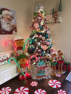 a christmas tree decorated with candy canes and candies