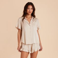 Discover the ultra-comfy short sleeve pajama set, complete with a ruffle trim and available in Neutral Champagne. Shop now at Birdy Grey. This ruffled PJ set is the perfect getting ready look, with a flirty, feminine twist. | Neutral Champagne Getting Ready Size 2X | Birdy Grey Esther Ruffled Short Sleeve Pajama Set Pajamas For Bridal Party, Unique Bridal Party Getting Ready Outfits, Bridesmaid Pajamas Wedding Day, Getting Ready Outfits For Bridesmaids, Bridal Party Getting Ready Outfit, Getting Ready Wedding Outfit, Wedding Getting Ready Outfit, Bridesmaid Getting Ready Outfit, Bride Getting Ready Outfit