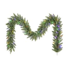 the letter m is made up of christmas lights and garlands on a white background